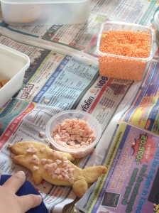 My contribution: decorating shark sugar cookies. n.b. we didn't have a cookie cutter.